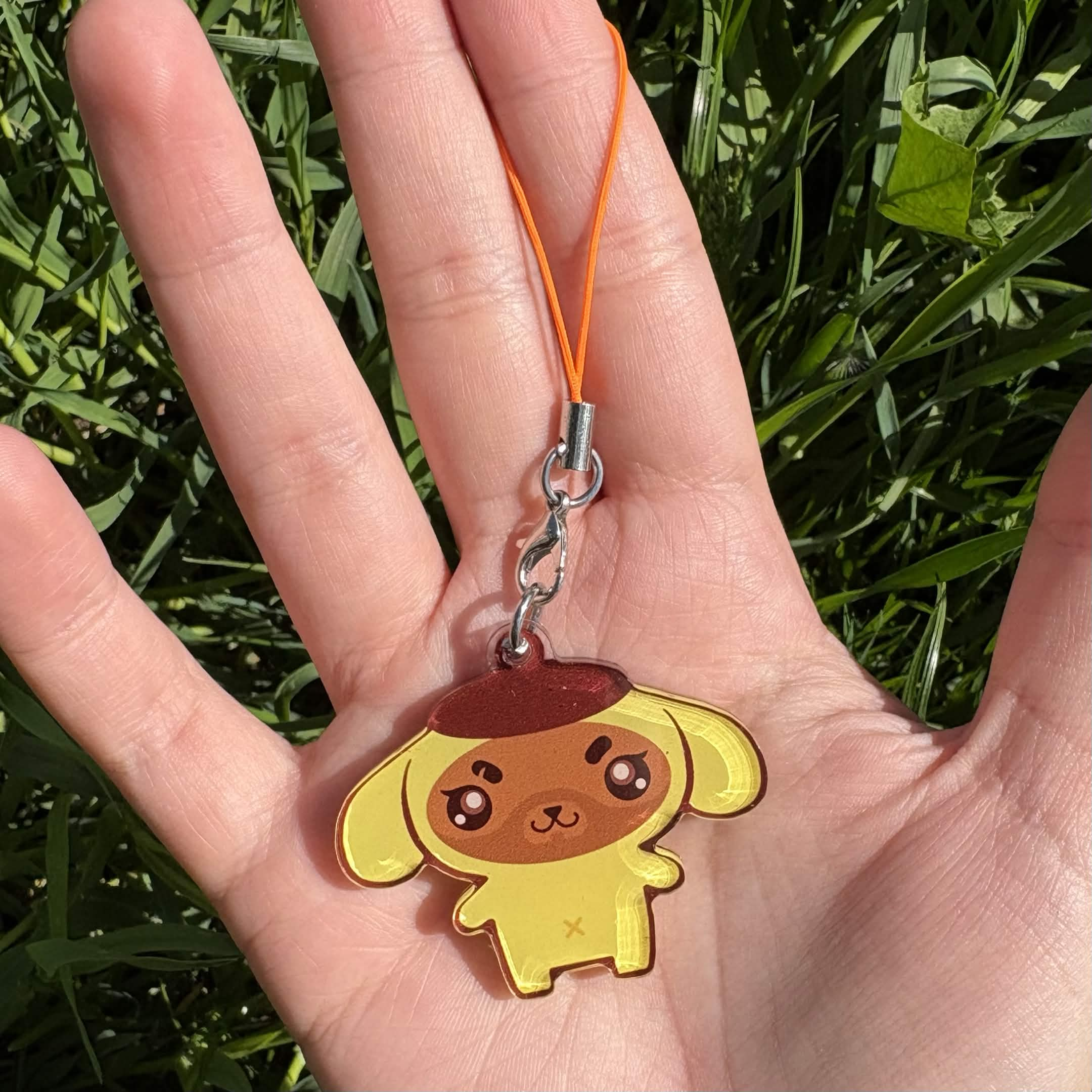 JomJomJurin full bleed phone charm